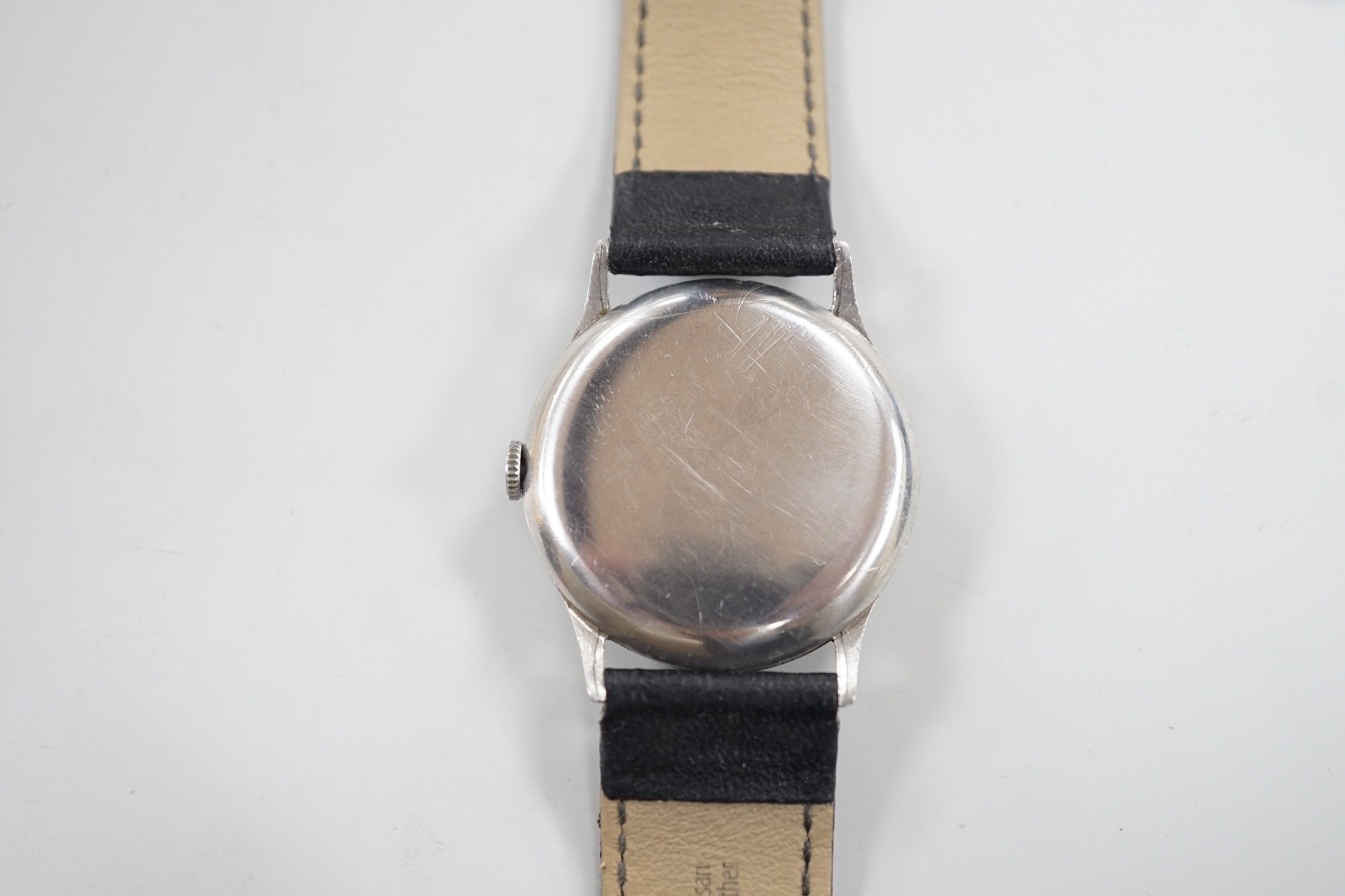 A gentleman's stainless steel Zenith manual wind wrist watch, the movement signed Mappin, on later associated leather strap, case diameter 36mm.